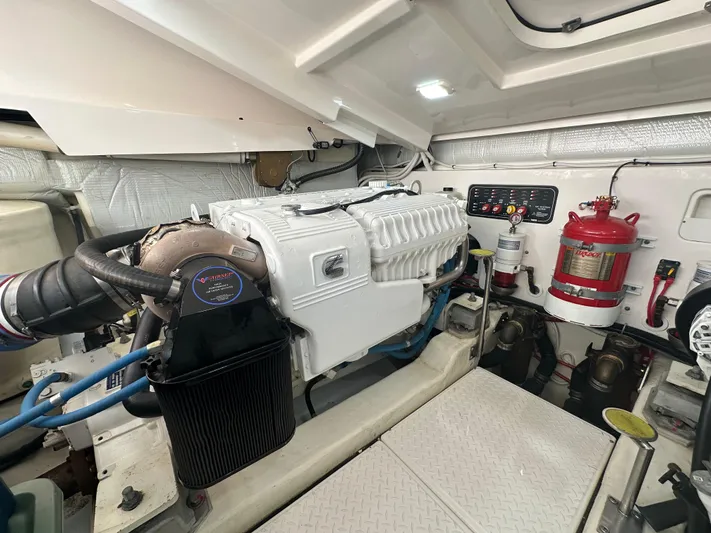  Yacht Photos Pics Engine room of 2018 Tiara Yachts 4300 Open, featuring machinery and safety equipment.