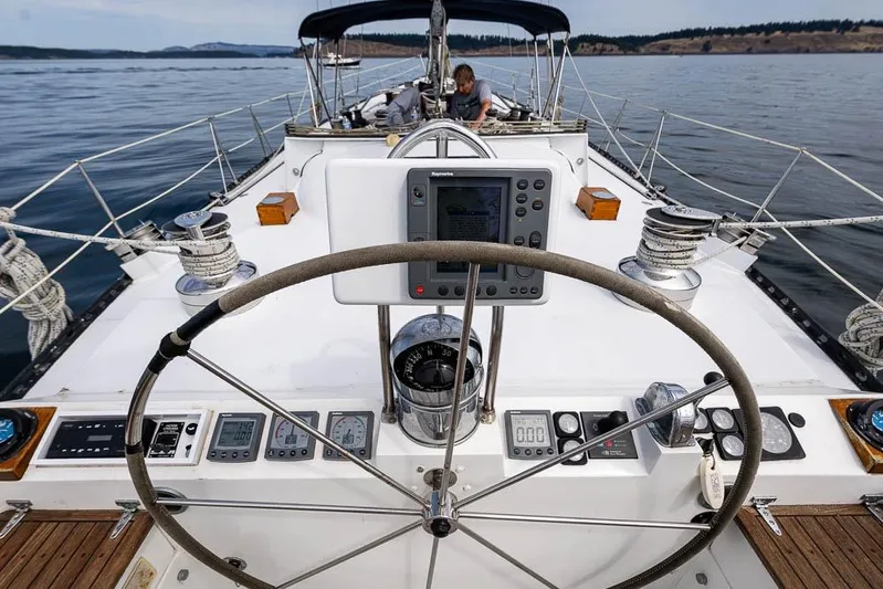 Koh -i -noor Yacht Photos Pics 1974 C&C 61 Ocean Racer/Cruiser yacht cockpit with steering wheel and navigation instruments.