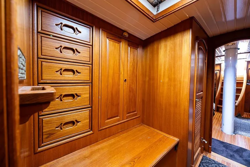 Koh -i -noor Yacht Photos Pics Interior of 1974 C&C 61 Ocean Racer/Cruiser with wooden cabinetry and seating area.