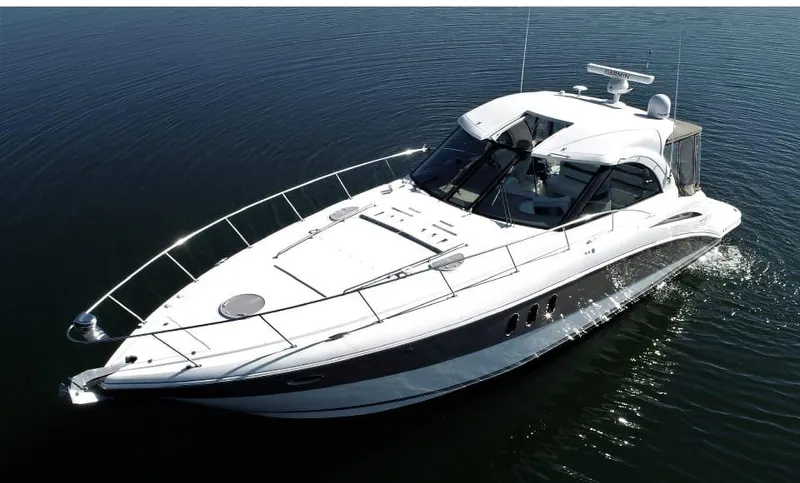  Yacht Photos Pics 2008 Cruisers 390 Sport Coupe yacht on calm water, aerial view.