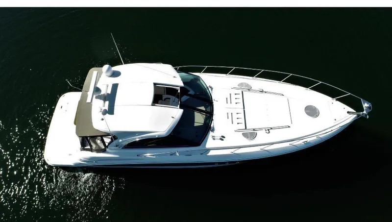  Yacht Photos Pics 2008 Cruisers 390 Sport Coupe yacht on calm water, aerial view.