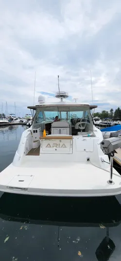  Yacht Photos Pics 2008 Cruisers 390 Sport Coupe docked at marina, rear view.