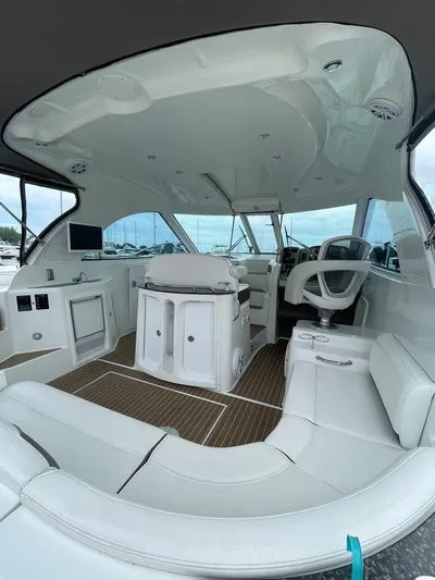  Yacht Photos Pics 2008 Cruisers 390 Sport Coupe interior with white seating and modern helm.
