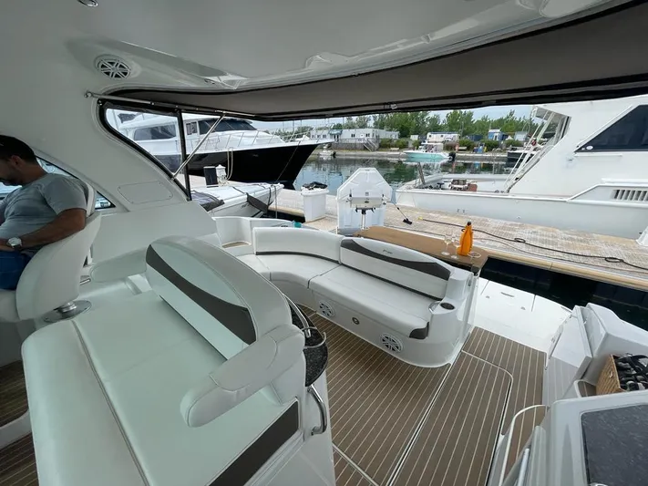  Yacht Photos Pics 2008 Cruisers 390 Sport Coupe interior with seating, docked at marina.