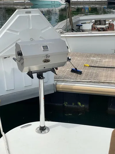  Yacht Photos Pics Outdoor grill on a 2008 Cruisers 390 Sport Coupe yacht deck.