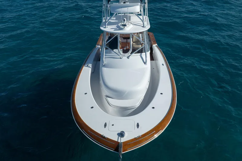 Southern Ground Yacht Photos Pics 2015 Winter Custom Yachts W-18 boat on clear blue water, aerial view.