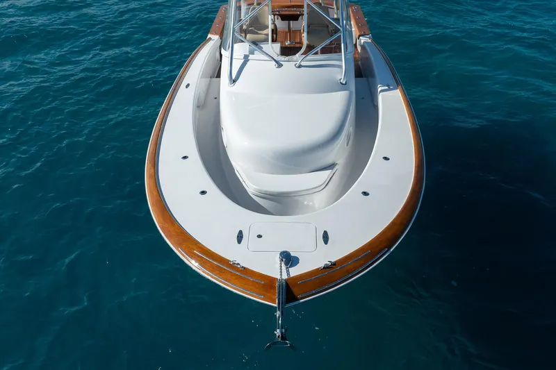 Southern Ground Yacht Photos Pics 2015 Winter Custom Yachts W-18 boat on clear blue water, top view.