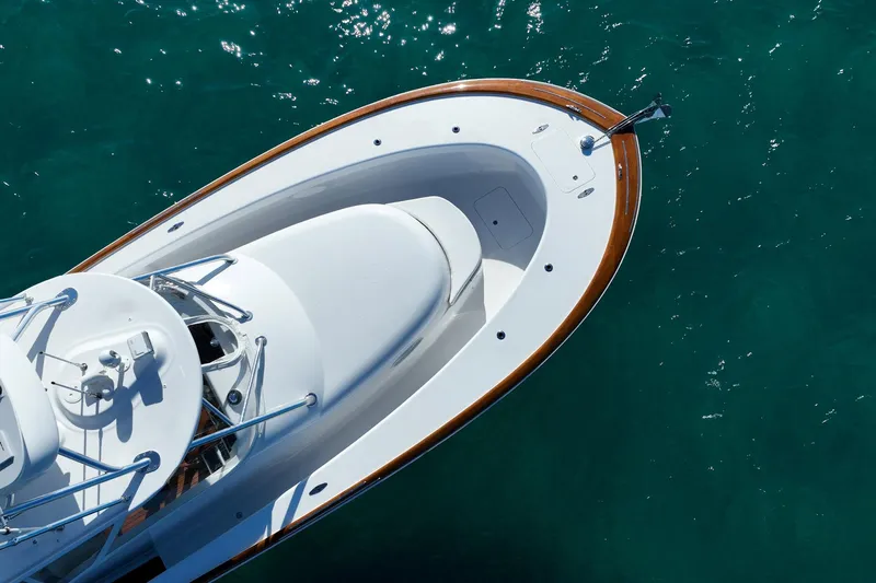 Southern Ground Yacht Photos Pics Overhead view of 2015 Winter Custom Yachts W-18 on clear blue water.