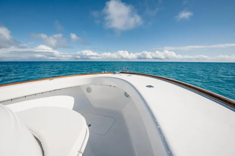 Southern Ground Yacht Photos Pics Bow view of 2015 Winter Custom Yachts W-18 on open ocean under blue sky.
