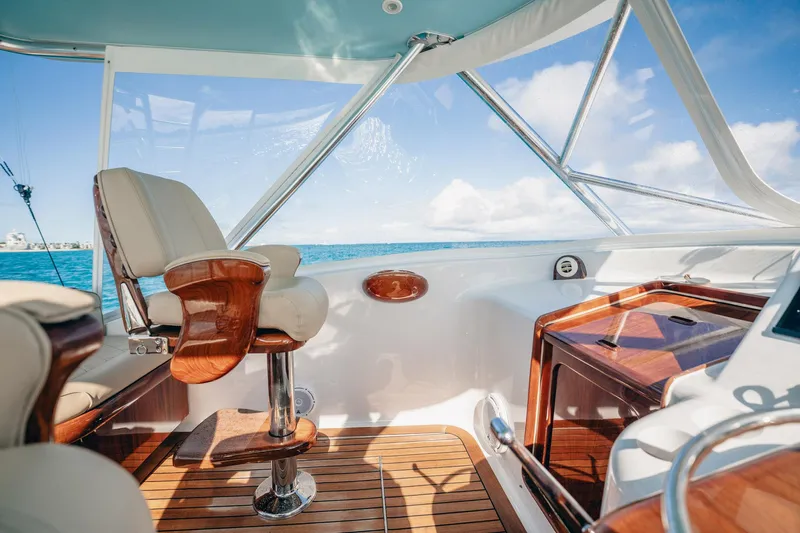 Southern Ground Yacht Photos Pics Luxurious interior of 2015 Winter Custom Yachts W-18, featuring elegant seating and ocean view.