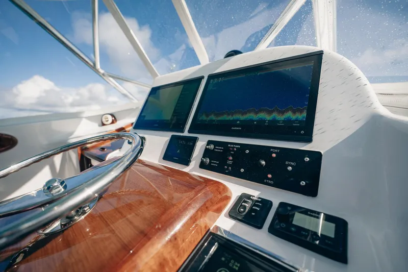 Southern Ground Yacht Photos Pics Helm of 2015 Winter Custom Yachts W-18 with navigation screens and controls.