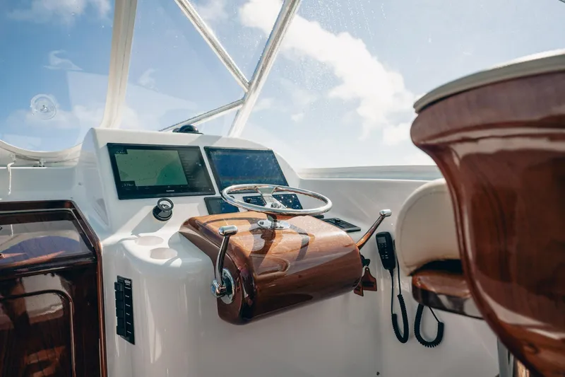 Southern Ground Yacht Photos Pics Interior helm of 2015 Winter Custom Yachts W-18, featuring modern navigation equipment.