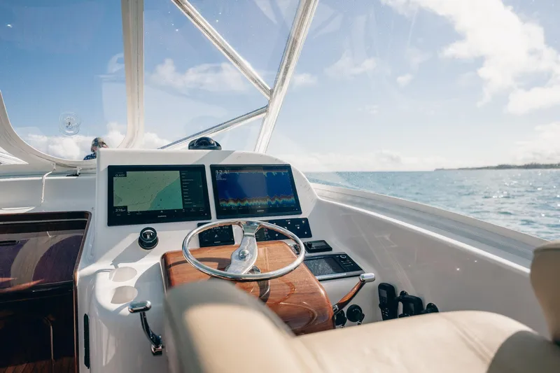 Southern Ground Yacht Photos Pics Helm of 2015 Winter Custom Yachts W-18 with navigation screens and ocean view.