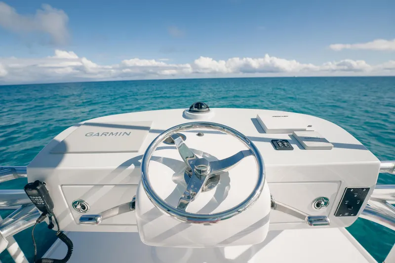 Southern Ground Yacht Photos Pics Steering console of 2015 Winter Custom Yachts W-18 with ocean view.