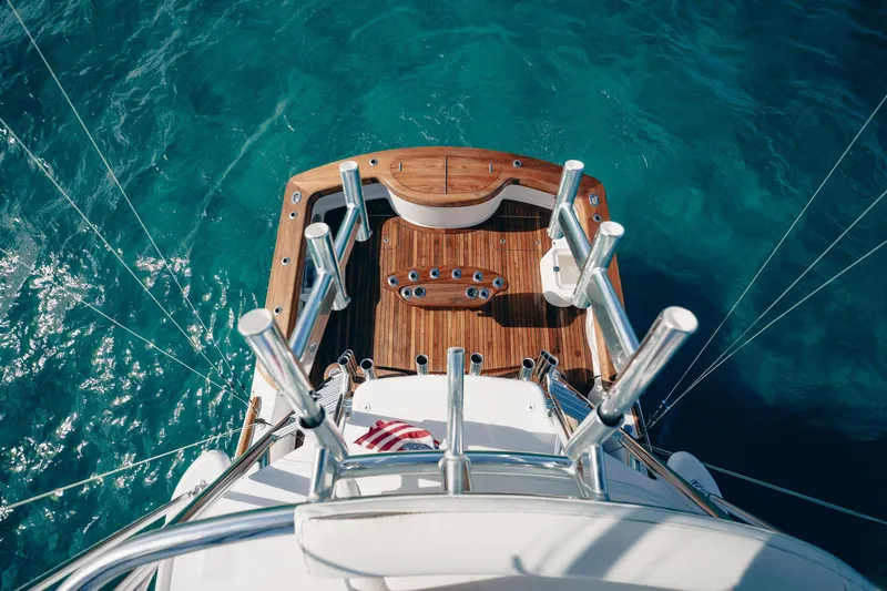 Southern Ground Yacht Photos Pics Aerial view of 2015 Winter Custom Yachts W-18 deck on clear blue water.