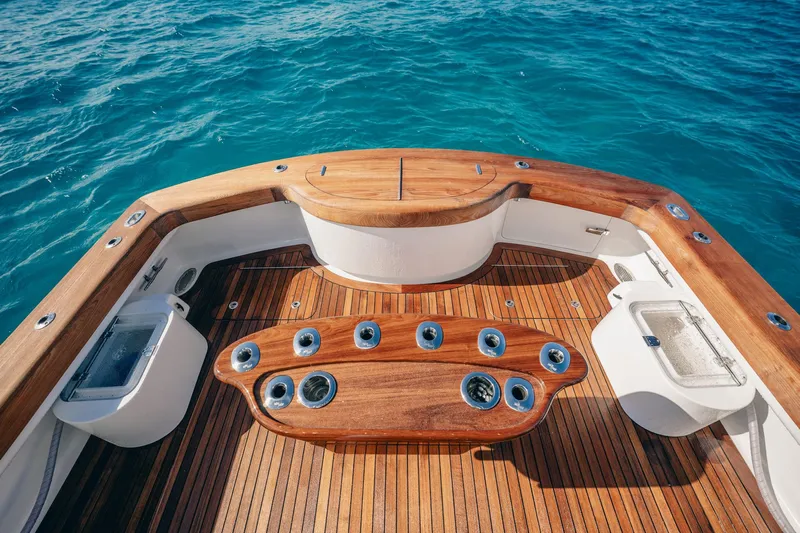Southern Ground Yacht Photos Pics Luxurious 2015 Winter Custom Yachts W-18 deck with teak finish on blue ocean.