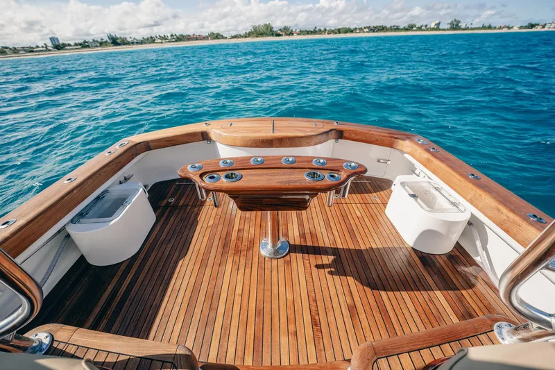 Southern Ground Yacht Photos Pics Luxurious 2015 Winter Custom Yachts W-18 deck with wooden finish on open sea.