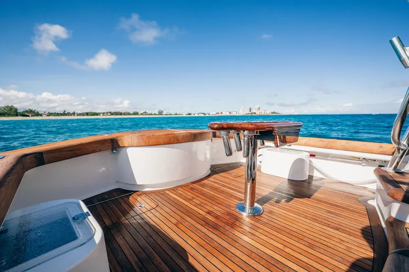 Southern Ground Yacht Photos Pics Luxurious 2015 Winter Custom Yachts W-18 deck with ocean view and wooden flooring.