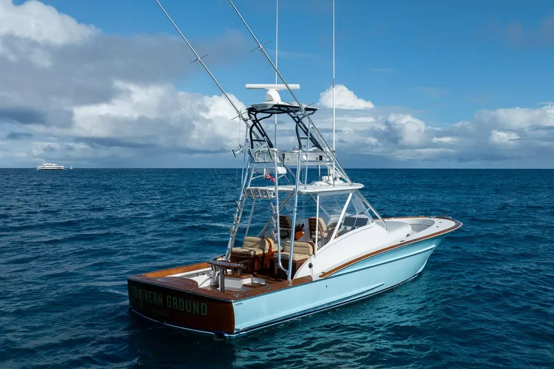 Southern Ground Yacht Photos Pics 2015 Winter Custom Yachts W-18 boat on open ocean under blue sky.