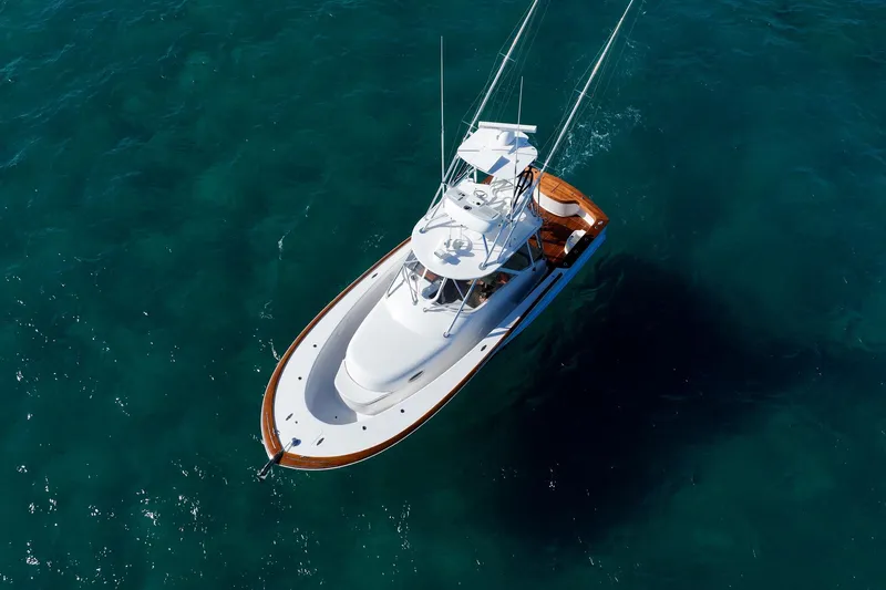 Southern Ground Yacht Photos Pics Aerial view of 2015 Winter Custom Yachts W-18 on clear blue water.