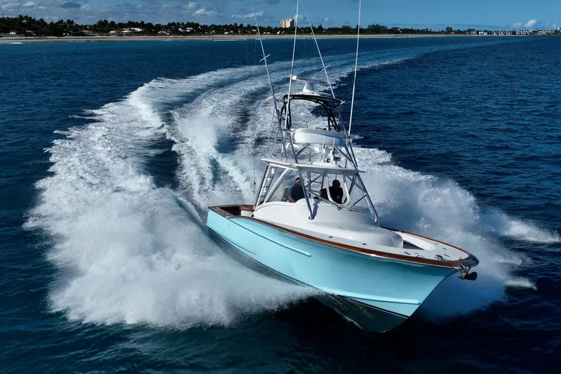 Southern Ground Yacht Photos Pics 2015 Winter Custom Yachts W-18 cruising on open blue ocean waters.