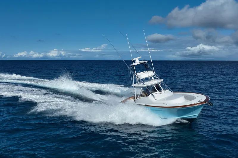 Southern Ground Yacht Photos Pics 2015 Winter Custom Yachts W-18 cruising on open ocean under clear blue sky.