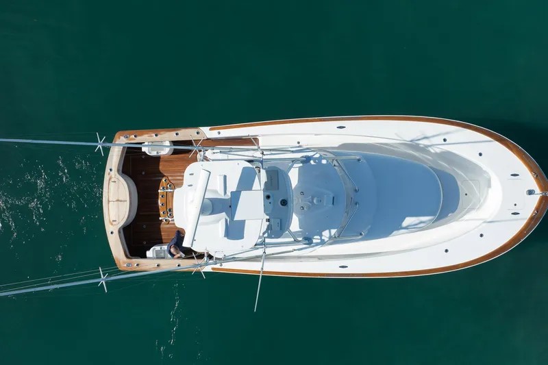 Southern Ground Yacht Photos Pics Aerial view of 2015 Winter Custom Yachts W-18 boat on clear water.