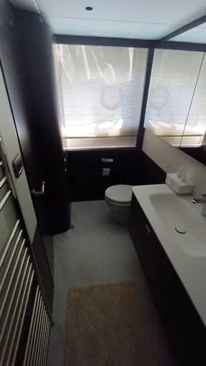  Yacht Photos Pics Modern bathroom interior on 2024 Princess X80 yacht, featuring sleek design and natural lighting.