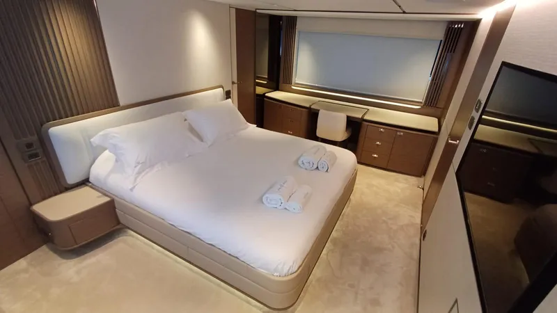  Yacht Photos Pics Luxurious bedroom interior of 2024 Princess X80 yacht with modern design and elegant furnishings.