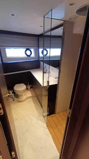  Yacht Photos Pics Luxurious bathroom in 2024 Princess X80 yacht with modern fixtures and elegant design.