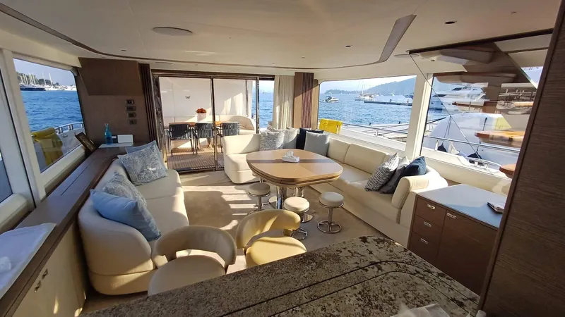  Yacht Photos Pics Luxurious interior of 2024 Princess X80 yacht with elegant seating and ocean view.