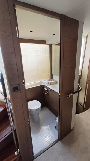  Yacht Photos Pics Luxurious bathroom in 2024 Princess X80 yacht with modern fixtures and elegant design.