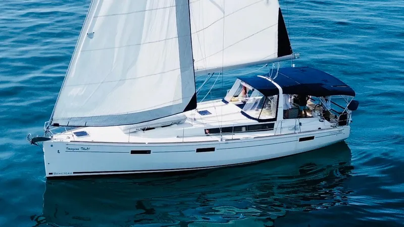 “imagine That” Yacht Photos Pics 2015 Beneteau Oceanis 45 sailing yacht on calm blue waters.