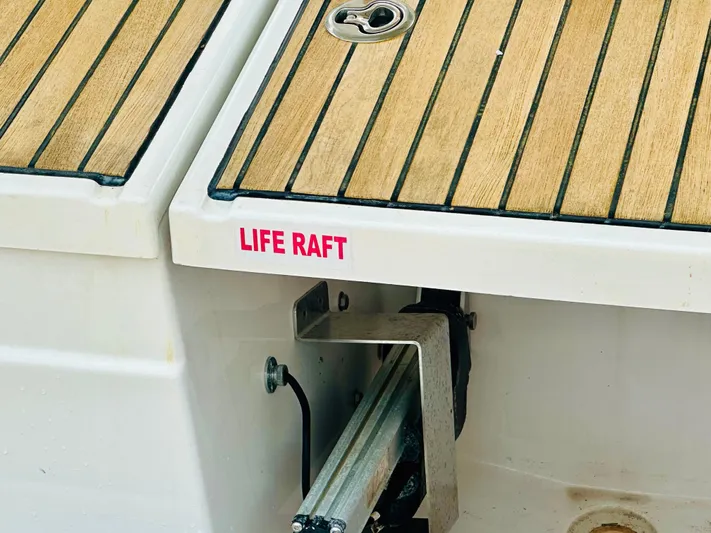 “imagine That” Yacht Photos Pics Beneteau Oceanis 45 (2015) deck with life raft compartment.