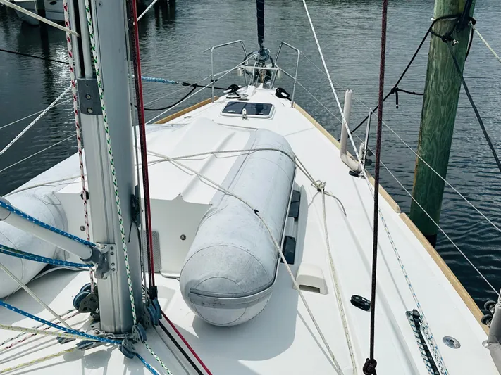 “imagine That” Yacht Photos Pics 2015 Beneteau Oceanis 45 sailboat deck with dinghy and rigging.