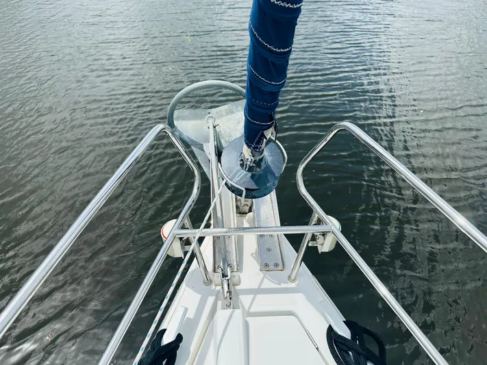 “imagine That” Yacht Photos Pics Bow view of 2015 Beneteau Oceanis 45 sailboat with anchor and railing.