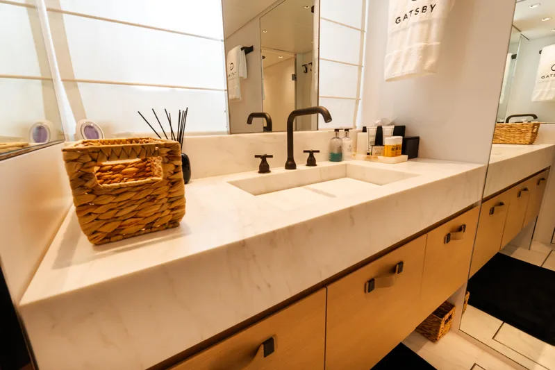 Gatsby Yacht Photos Pics Luxurious bathroom on 2021 Sanlorenzo SL96 yacht with modern sink and elegant decor.