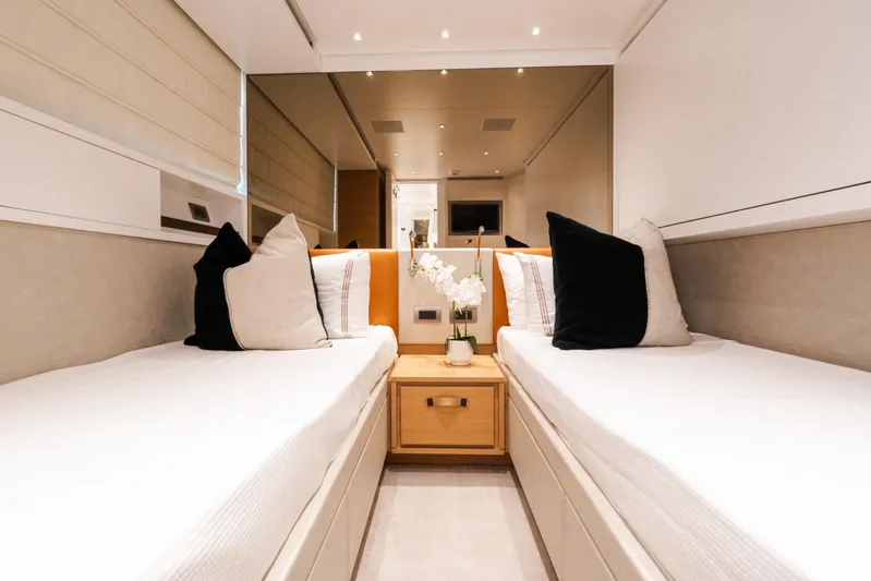 Gatsby Yacht Photos Pics Luxurious twin cabin interior on 2021 Sanlorenzo SL96 yacht, featuring elegant decor and plush bedding.
