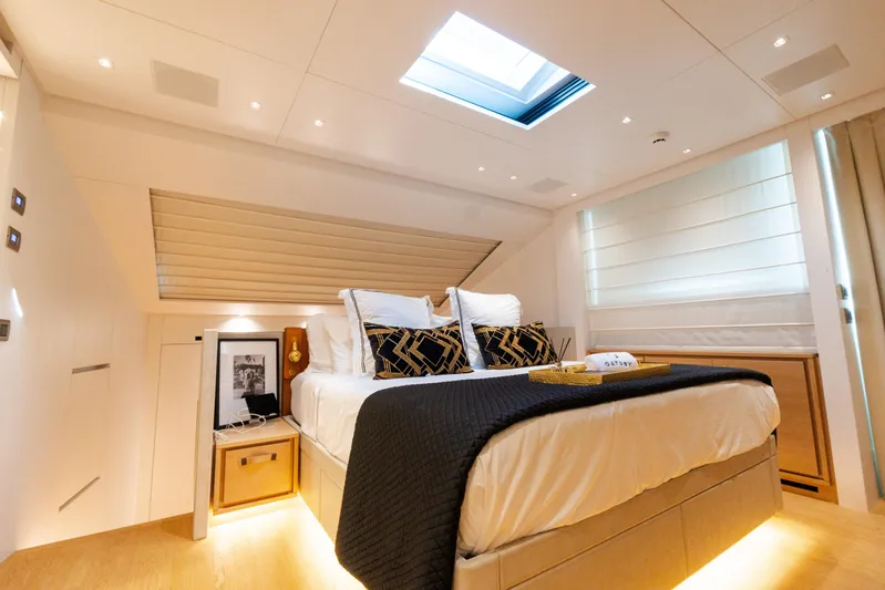 Gatsby Yacht Photos Pics Luxurious bedroom interior of 2021 Sanlorenzo SL96 yacht with modern design and skylight.