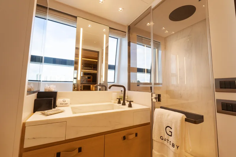 Gatsby Yacht Photos Pics Luxurious bathroom on 2021 Sanlorenzo SL96 yacht with elegant fixtures and modern design.
