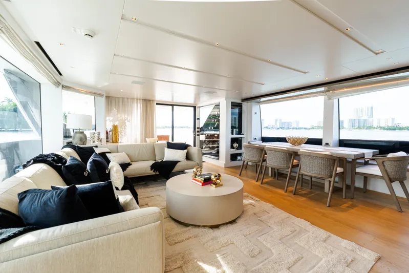 Gatsby Yacht Photos Pics Luxurious interior of 2021 Sanlorenzo SL96 yacht with elegant seating and dining area.