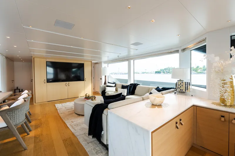 Gatsby Yacht Photos Pics Luxurious interior of 2021 Sanlorenzo SL96 yacht with modern furnishings and large windows.
