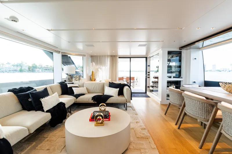 Gatsby Yacht Photos Pics Luxurious interior of 2021 Sanlorenzo SL96 yacht with elegant seating and dining area.