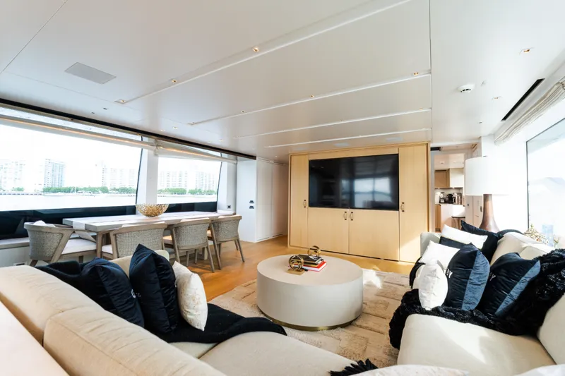Gatsby Yacht Photos Pics Luxurious interior of 2021 Sanlorenzo SL96 yacht with modern furnishings and large windows.