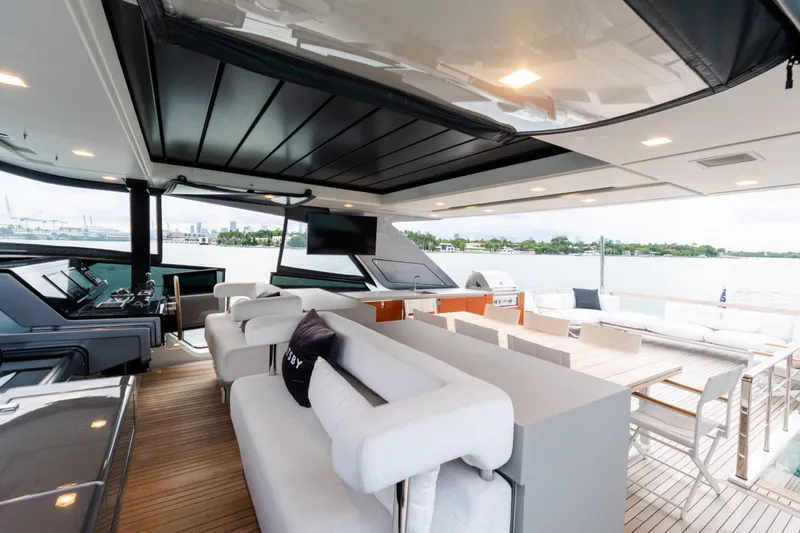 Gatsby Yacht Photos Pics Luxurious 2021 Sanlorenzo SL96 yacht interior with modern seating and scenic water views.