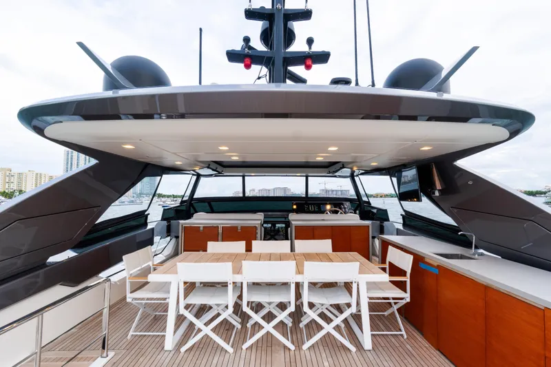 Gatsby Yacht Photos Pics Luxurious 2021 Sanlorenzo SL96 yacht deck with dining area and modern amenities.