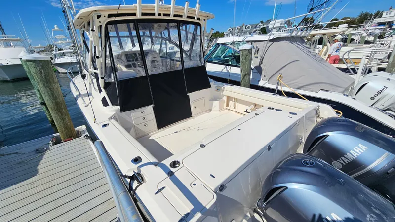  Yacht Photos Pics 2016 Grady-White Express 330 boat docked with twin Yamaha engines.