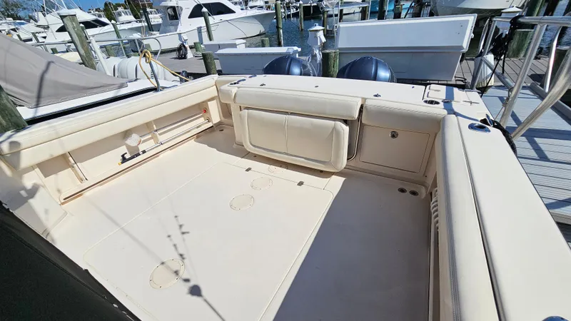  Yacht Photos Pics 2016 Grady-White Express 330 boat deck with seating, docked at marina.