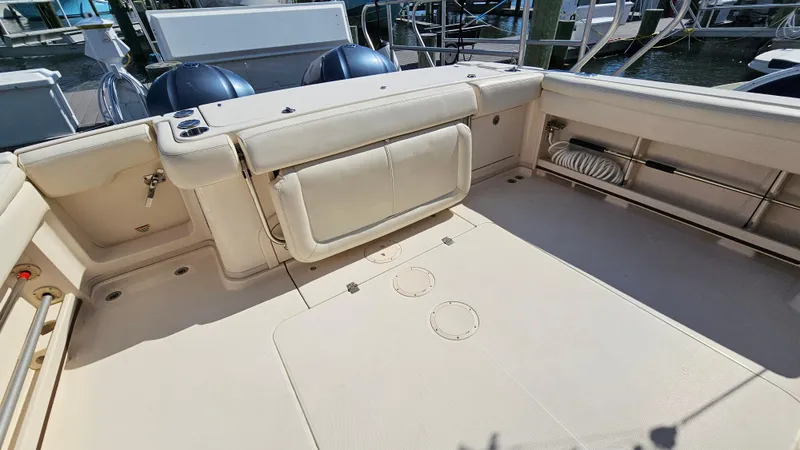  Yacht Photos Pics 2016 Grady-White Express 330 boat deck with seating and storage.