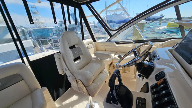  Yacht Photos Pics Interior of 2016 Grady-White Express 330 boat with helm and seating.